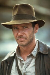 Harrison Ford wearing the iconic hat from Indiana Jones